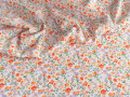Плательная молочная оранжевая ткань цветы листья ДЕ357