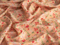 Плательная персиковая ткань цветы листья ДЕ362